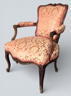 Louis XV period armchair in carved wood, damask upholstery 18th Century