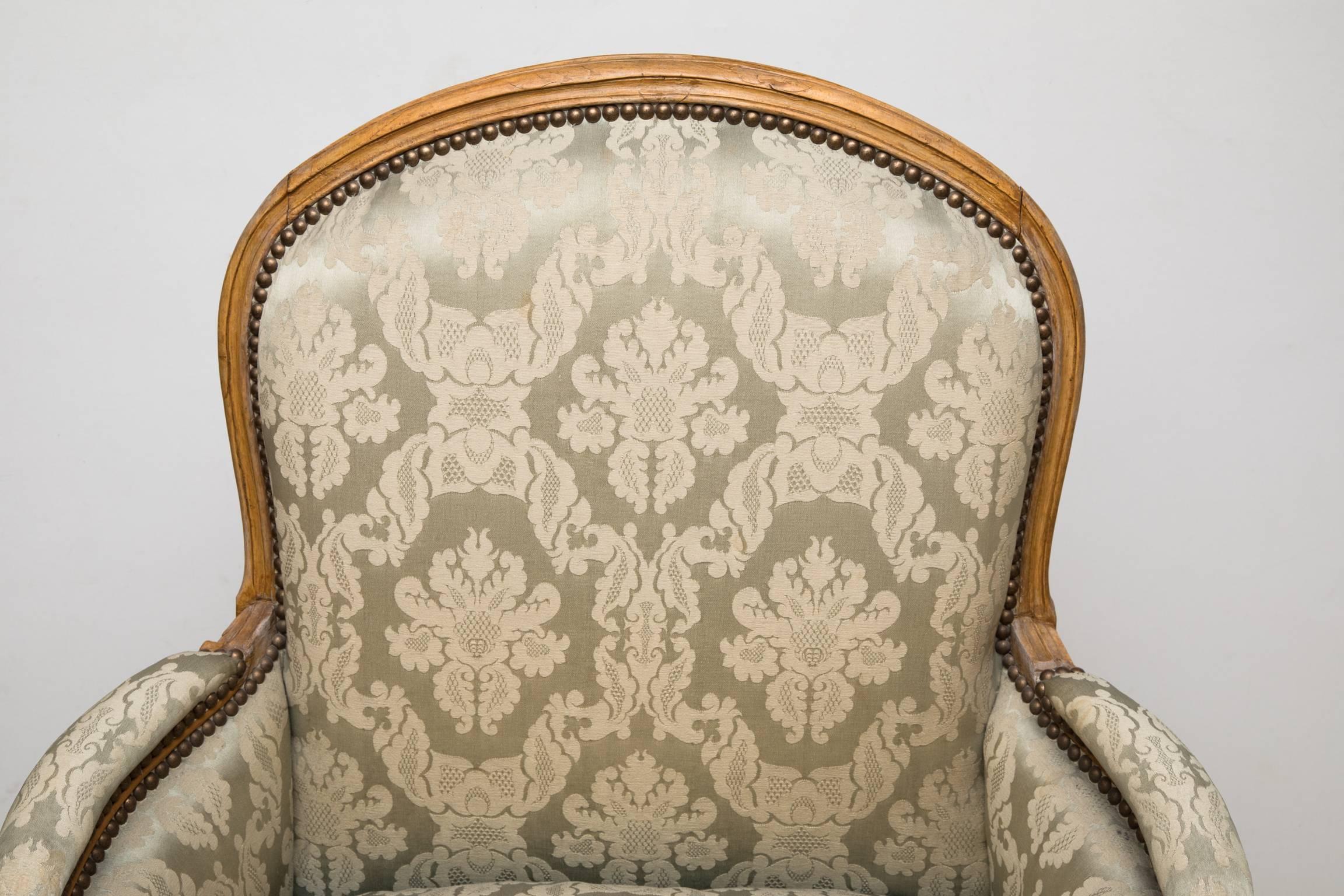 18th Century Louis XV Period Beech Bergere or Armchair Upholstered in Pale Silk Damask For Sale