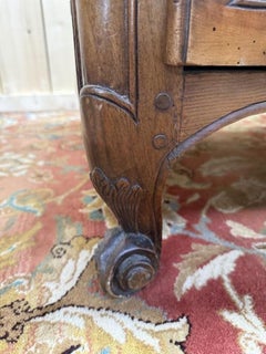 Louis XV Period Chest of Drawers in Solid Walnut with Carved Shell Handles