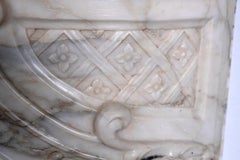 Louis XV period fireplace in Panazeau marble with finely carved entablature
