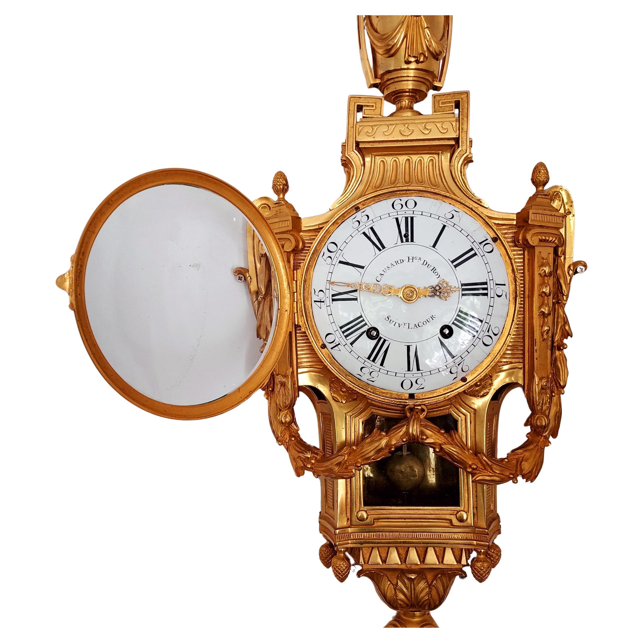 Horloge Ormulo d'époque Louis XV dorée 