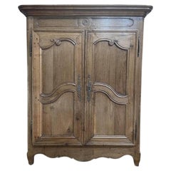Louis XV period low wardrobe in solid oak