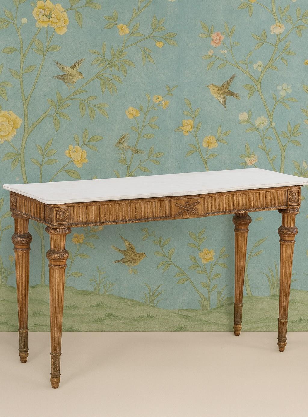 Stunning Louis XV period marble top giltwood console table (old but later marble).  The case having a fluted and decorated frieze supported by carved and fluted legs.  Good condition with wear and consistent with age, which adds to the charm of this