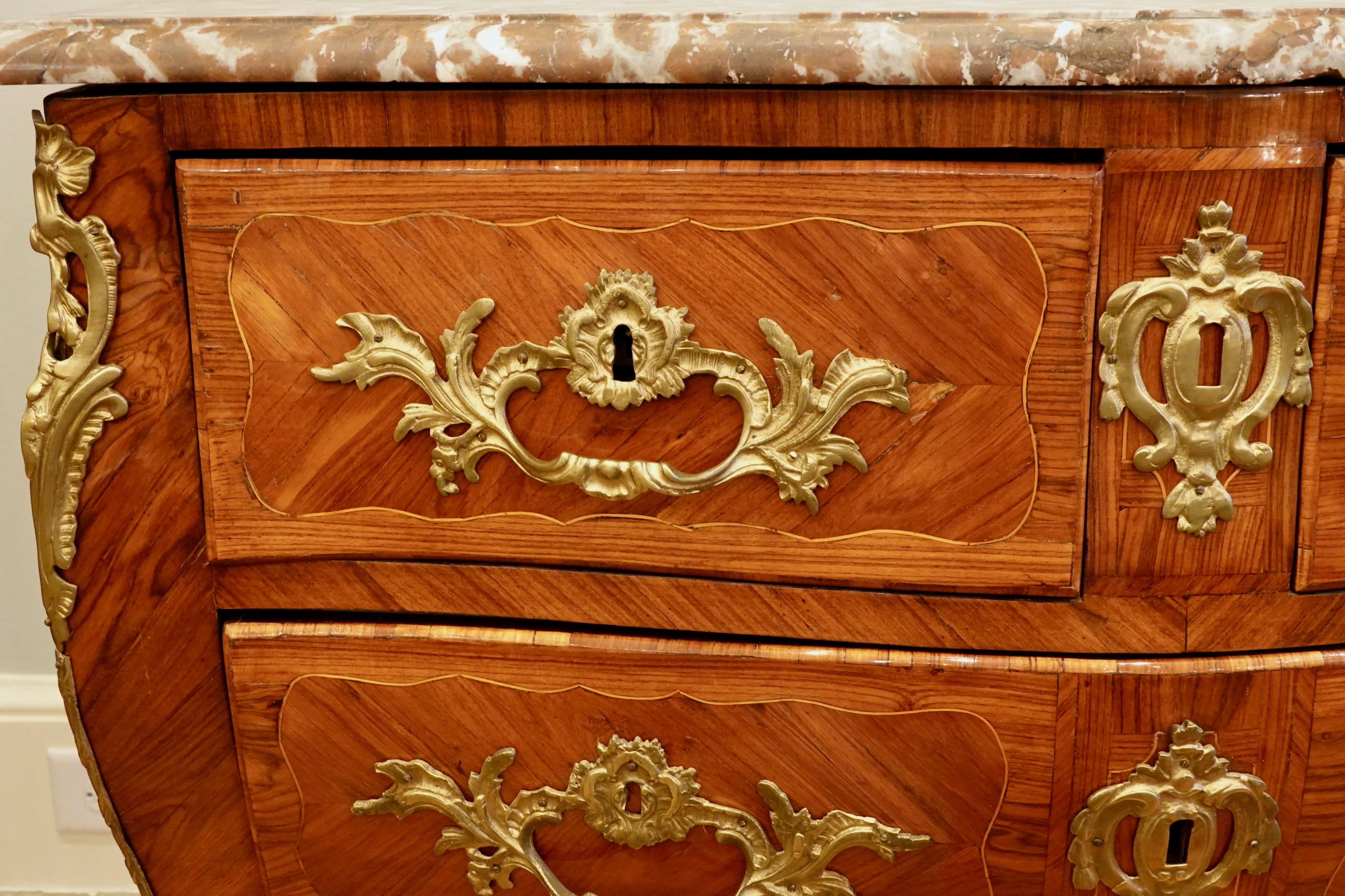 Louis XV Period Marquetry Stamped Commode with Rouge Royale Marble Top For Sale 8