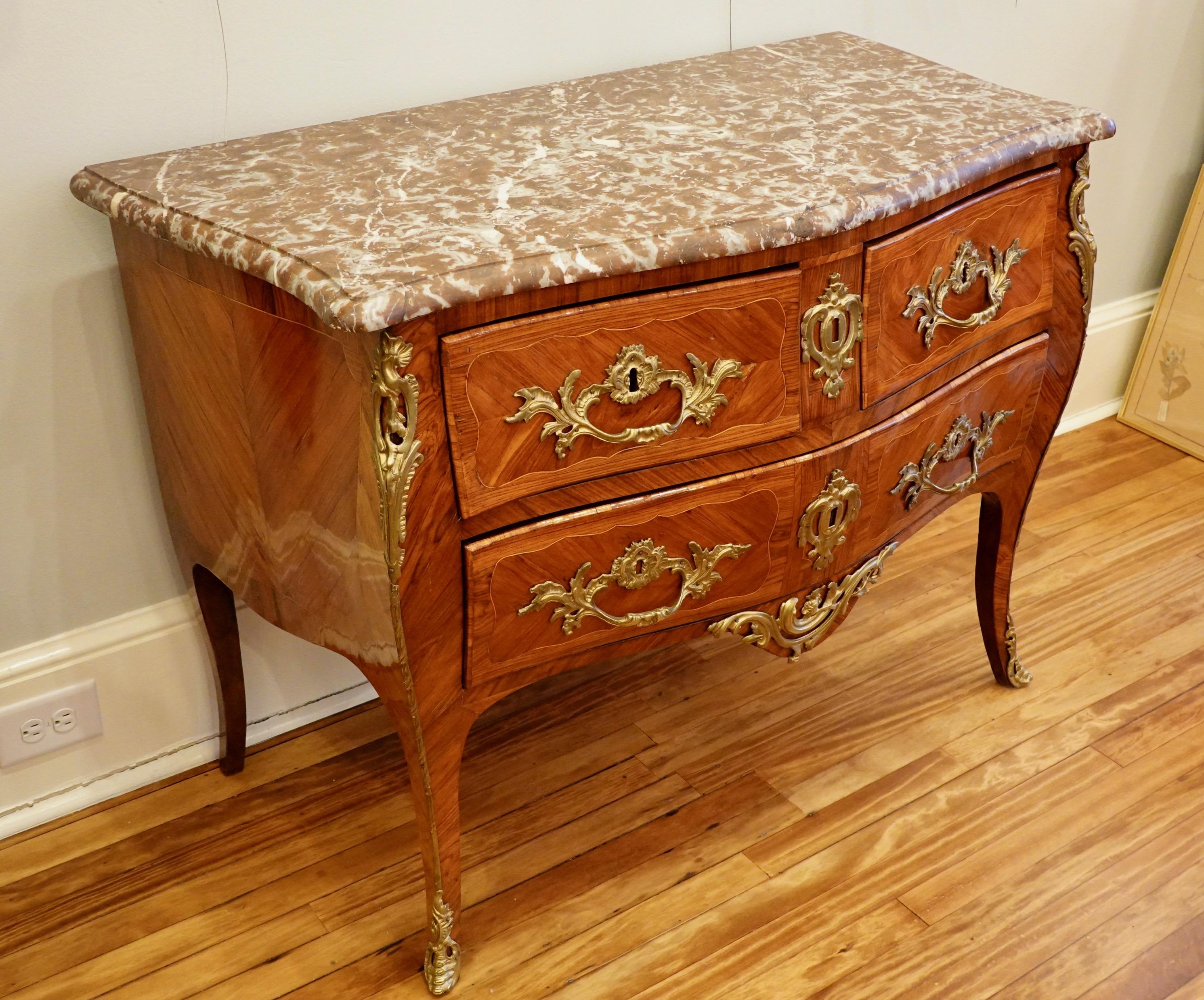 Gilt Louis XV Period Marquetry Stamped Commode with Rouge Royale Marble Top For Sale