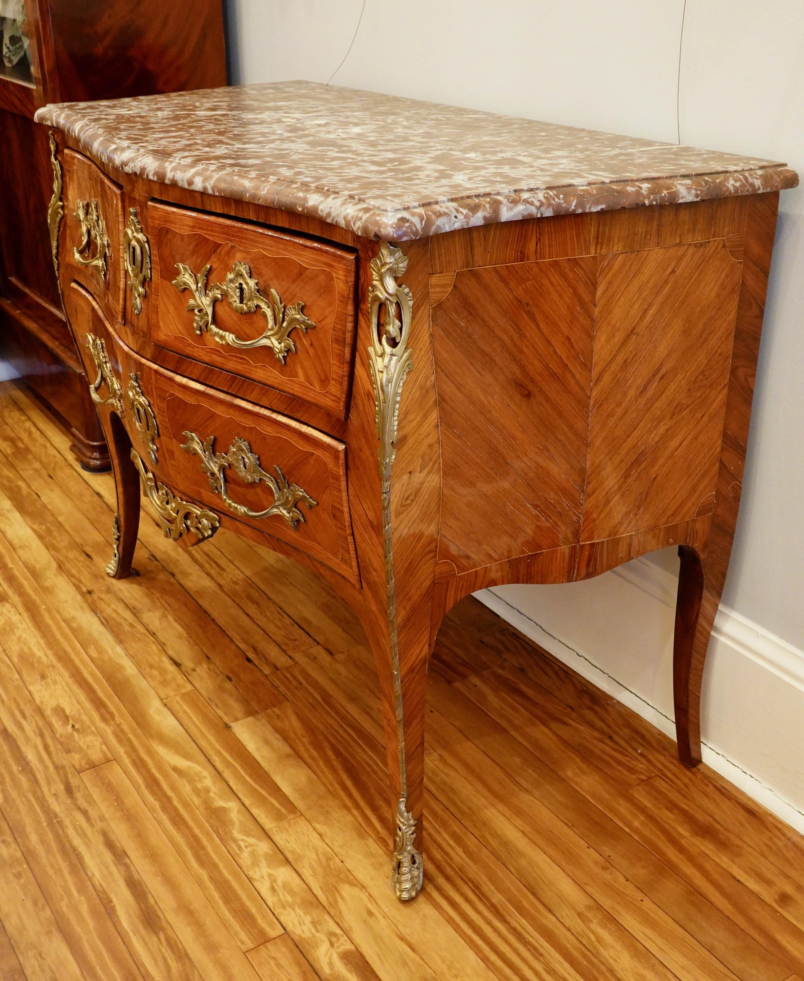 18th Century Louis XV Period Marquetry Stamped Commode with Rouge Royale Marble Top For Sale