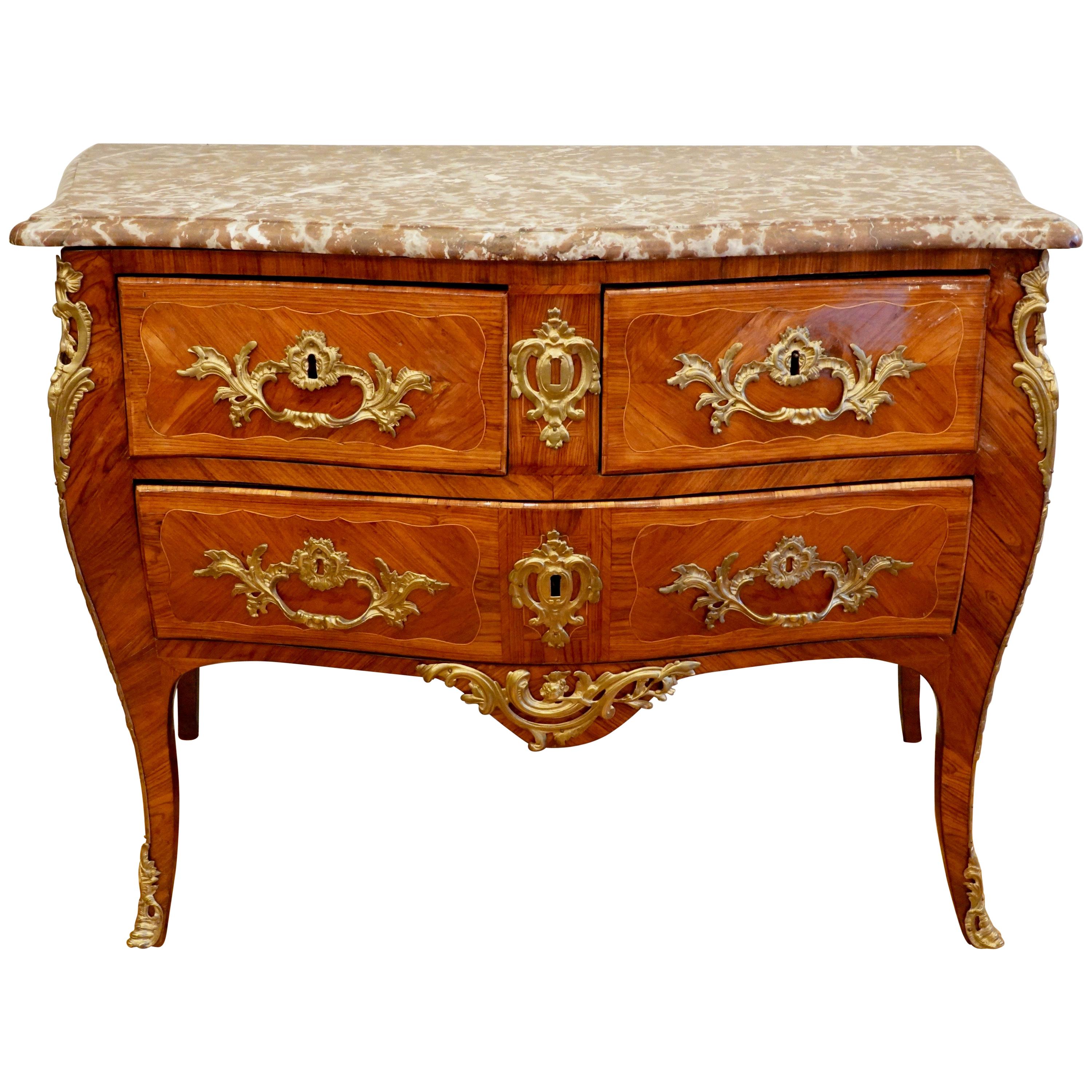 Louis XV Period Marquetry Stamped Commode with Rouge Royale Marble Top For Sale