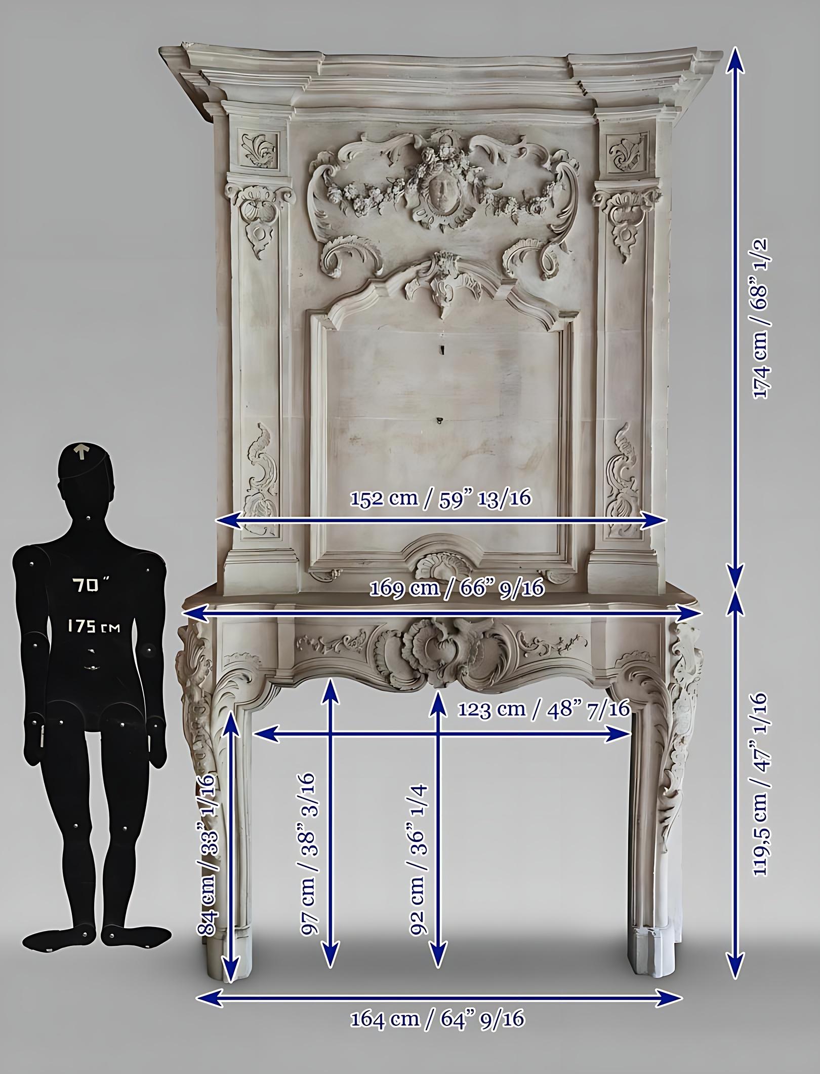 Cheminée en pierre d'époque Louis XV avec trumeau sculpté en vente 13