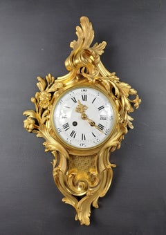 Horloge murale en bronze doré de style Louis XV Rococo