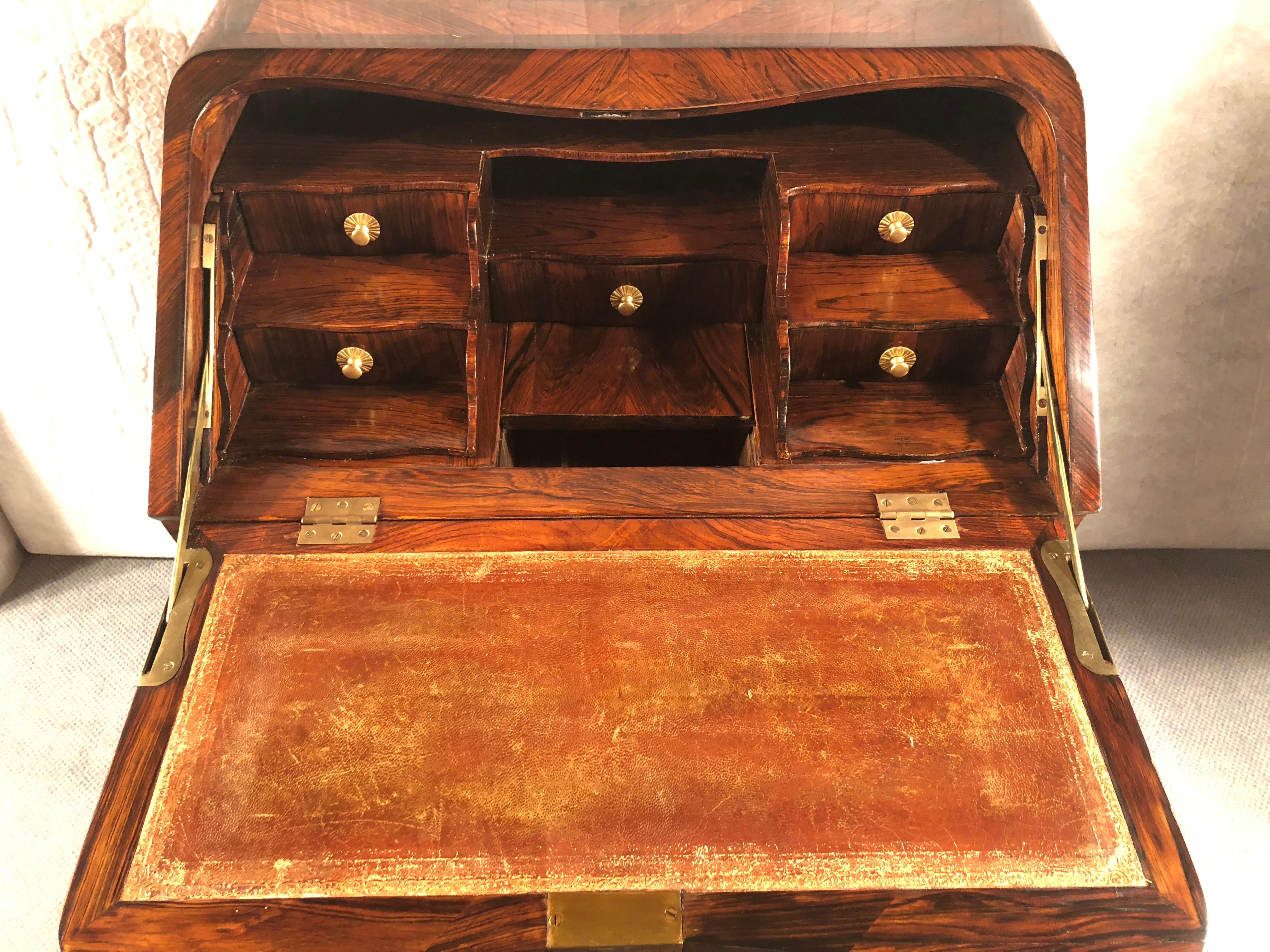 Exquisite secretaire de dame, France 18th century, beautiful kingwood veneer on front, sides, top, back and the inside. The writing surface is covered with leather. With original bronze fittings. The secretaire comes with 4 keys. It is in good