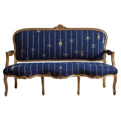 19th Century French Rococo Louis XV style handcrafted and foil gilded  Elegant Loveseat Settee