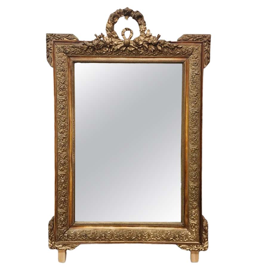 Mirror in a gold frame. For Sale at 1stDibs