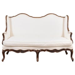 Louis XV Style 19th Century French Walnut Wingback Canapé with Cabriole Legs
