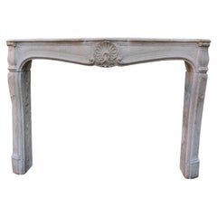Louis XV Style Antique Limestone Mantel