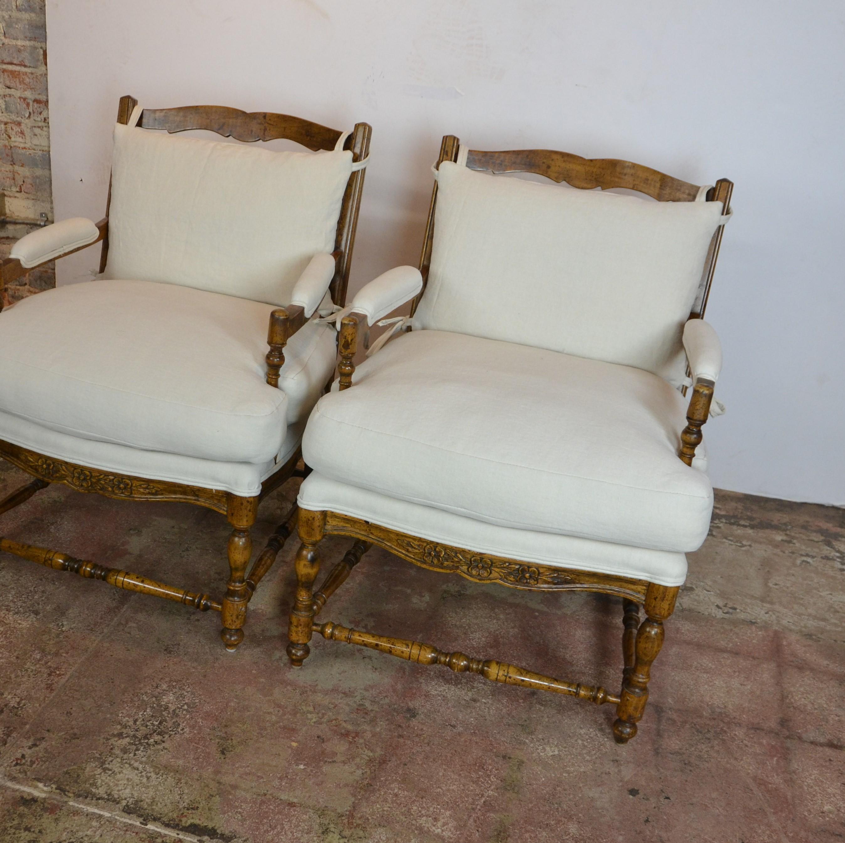 Ladder back Louis XV style armchairs. Upholstered in linen.