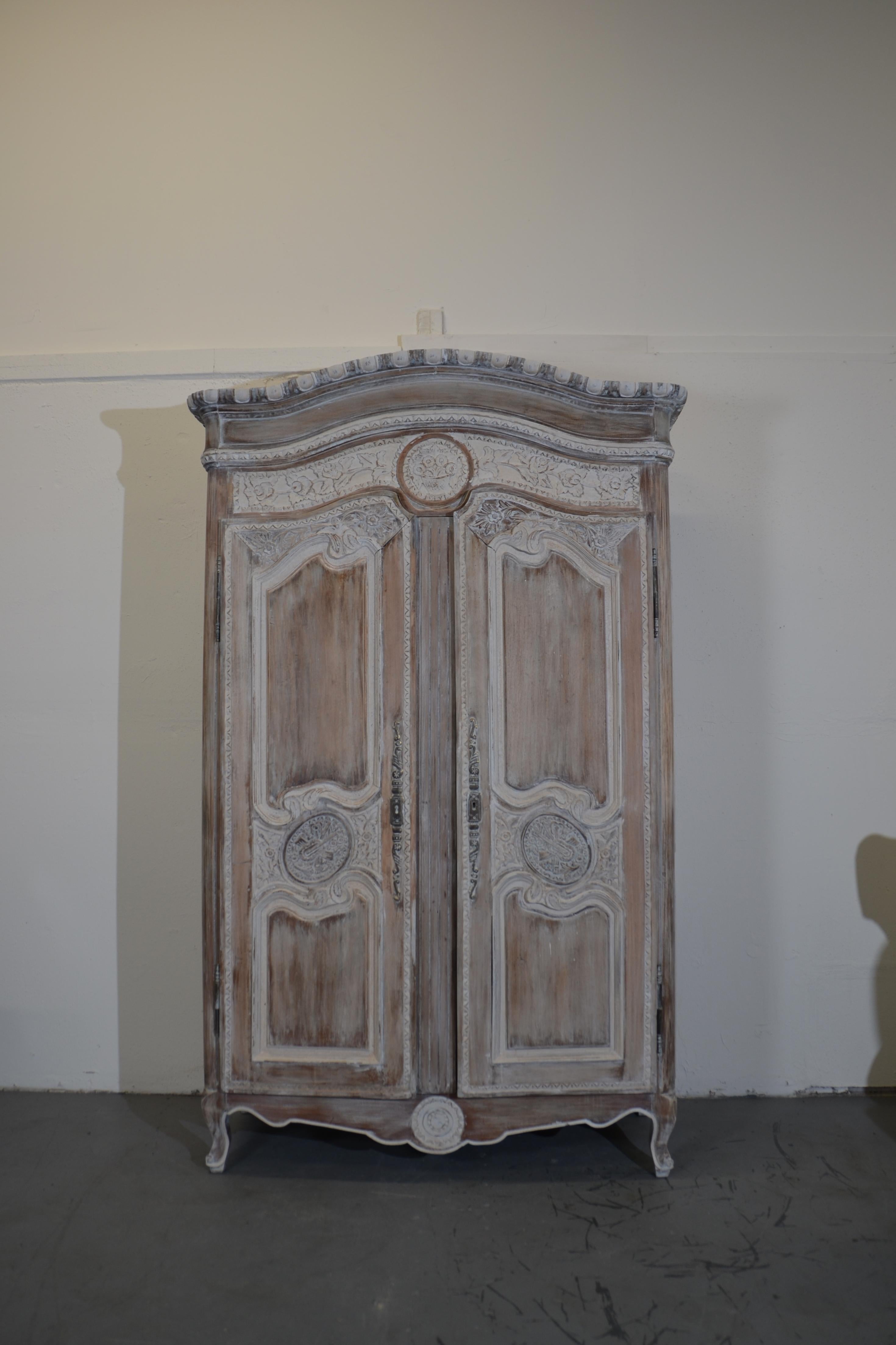 Louis xv style two-door hand-painted armoire. The shelves are adjustable.