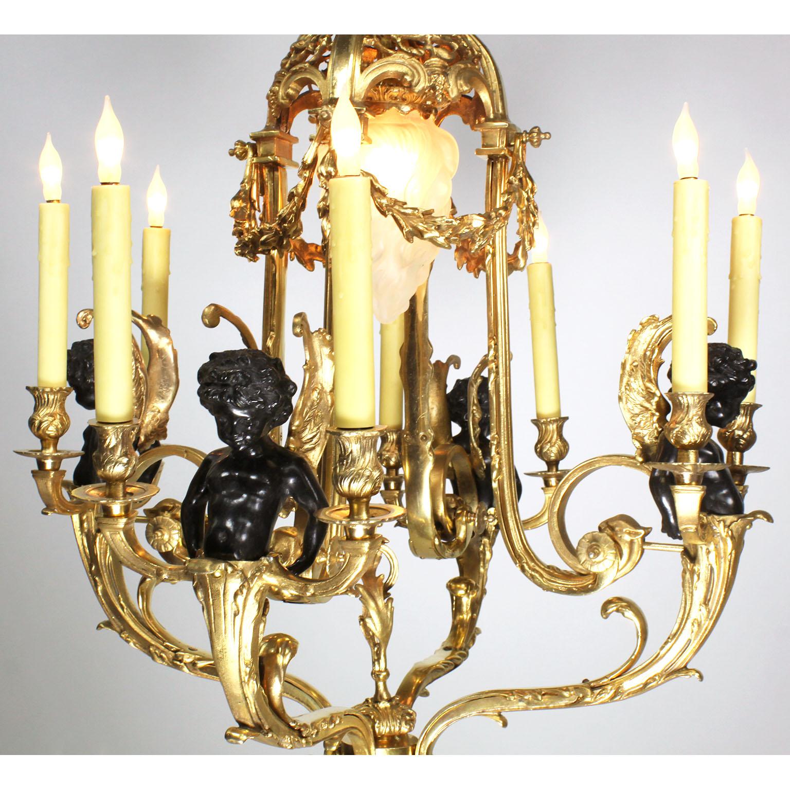 French Louis XV Style Belle Époque Gilt & Patinated Bronze Nine-Light Cherub Chandelier For Sale