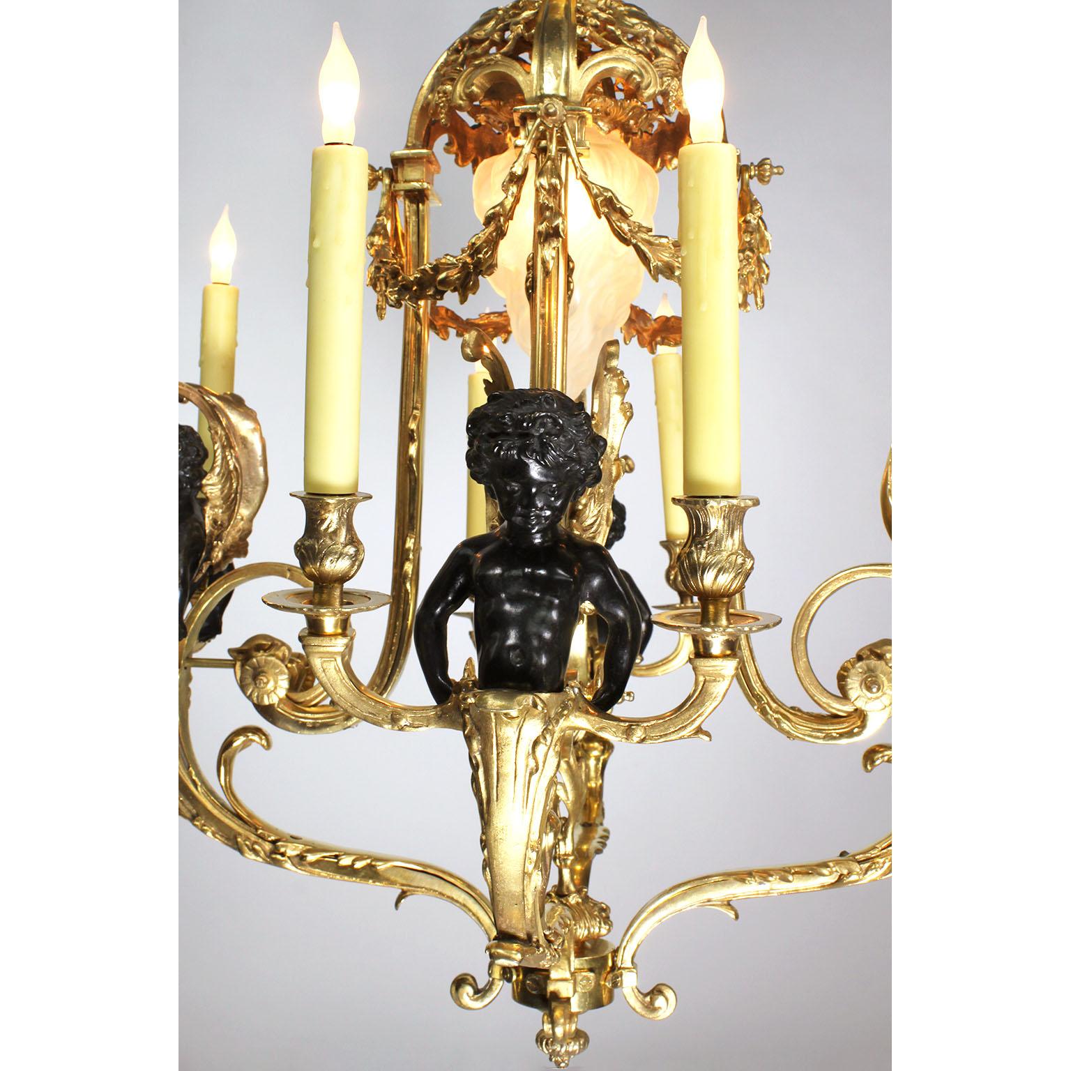 Early 20th Century Louis XV Style Belle Époque Gilt & Patinated Bronze Nine-Light Cherub Chandelier For Sale