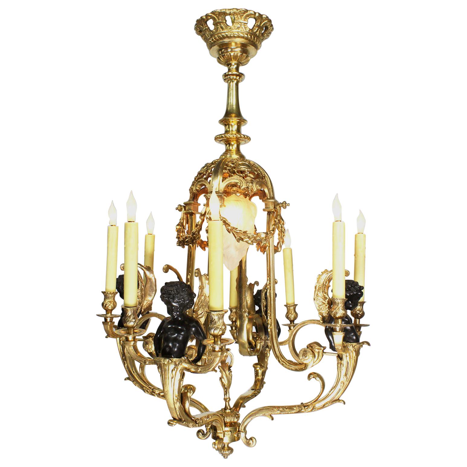 Louis XV Style Belle Époque Gilt & Patinated Bronze Nine-Light Cherub Chandelier For Sale
