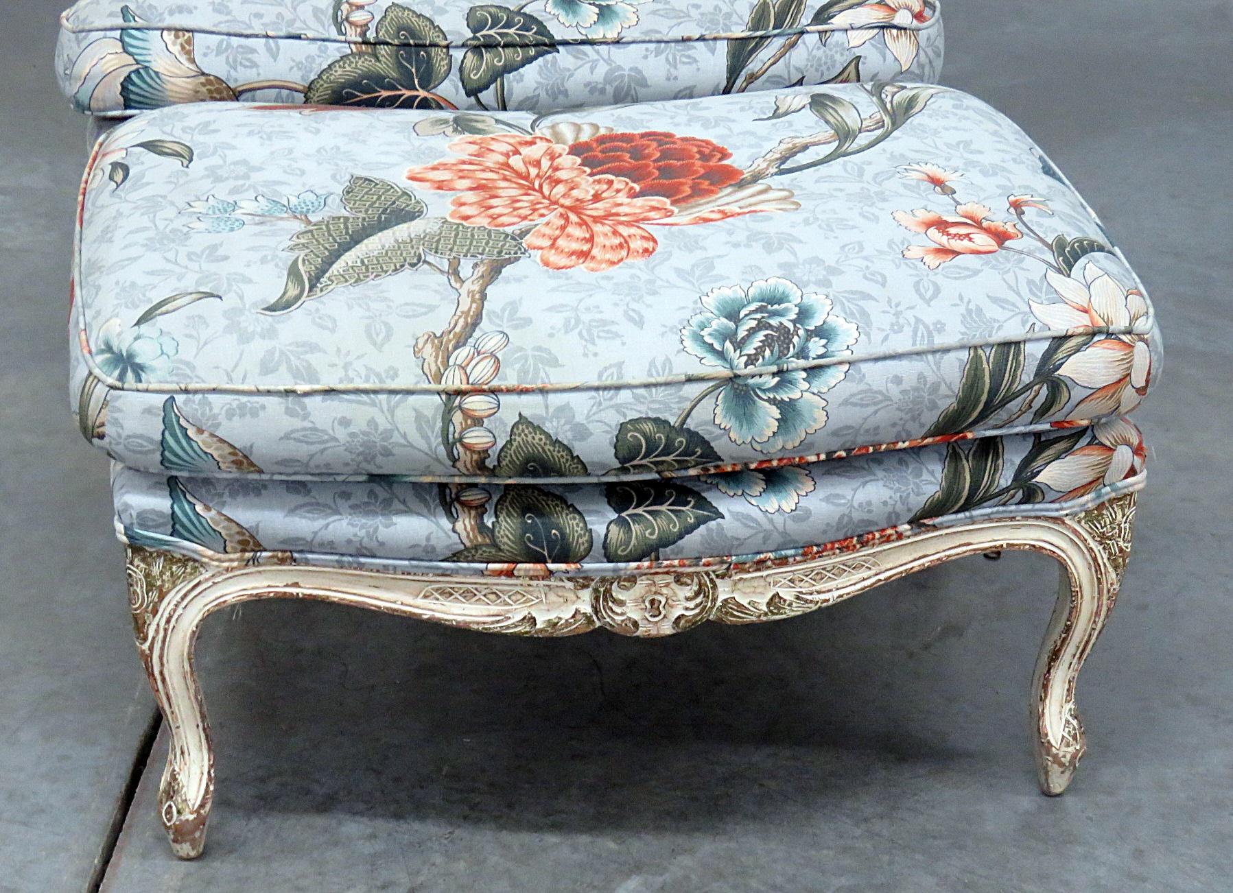 Louis XV style distressed painted bergere and ottoman. The bergere measures 37.5
