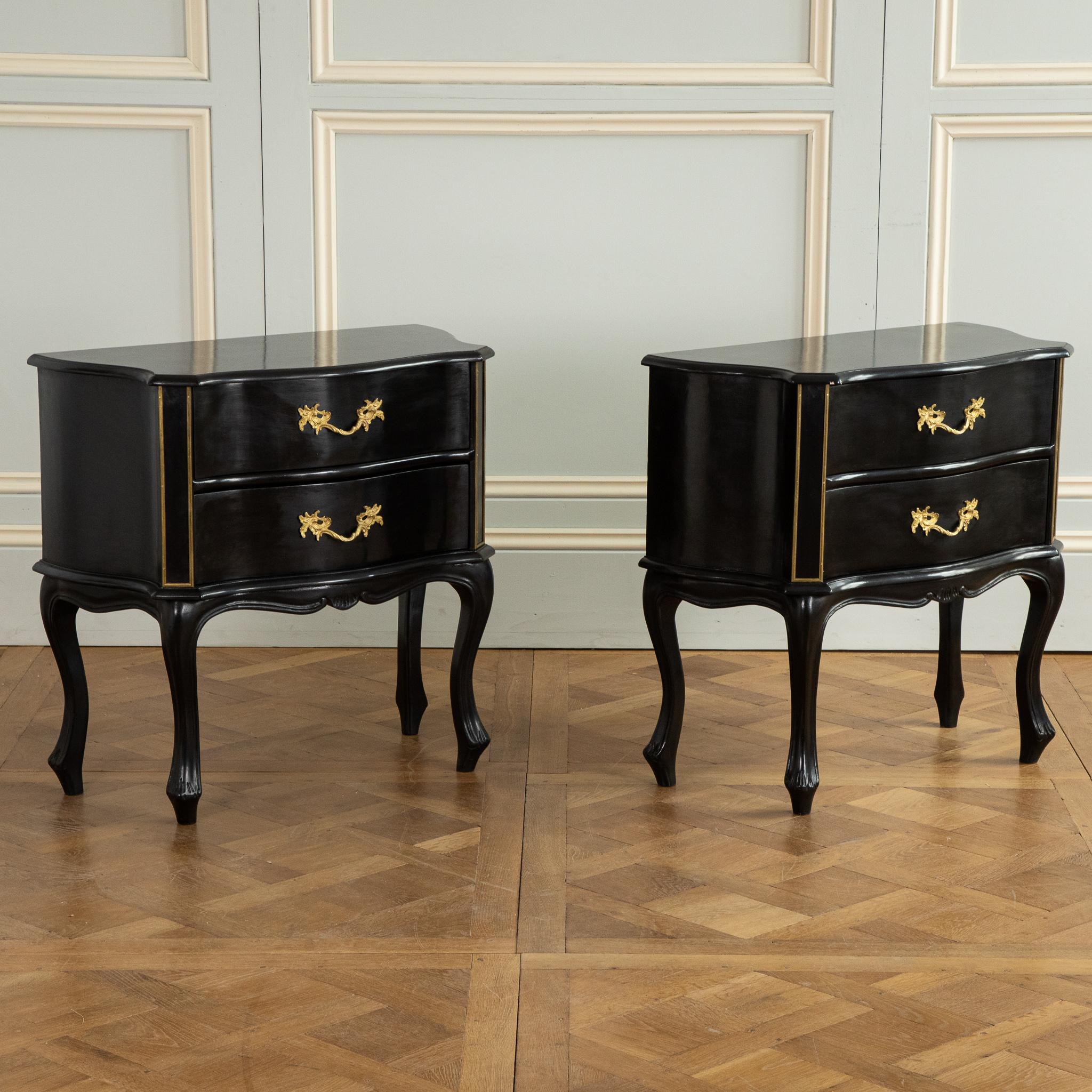 Pair of Louis XV style chest of drawers,Night stands made by La Maison London
Black lacquered with bronzes handles and filigree.
Serpentine legs 
2 x drawers per commode.
 