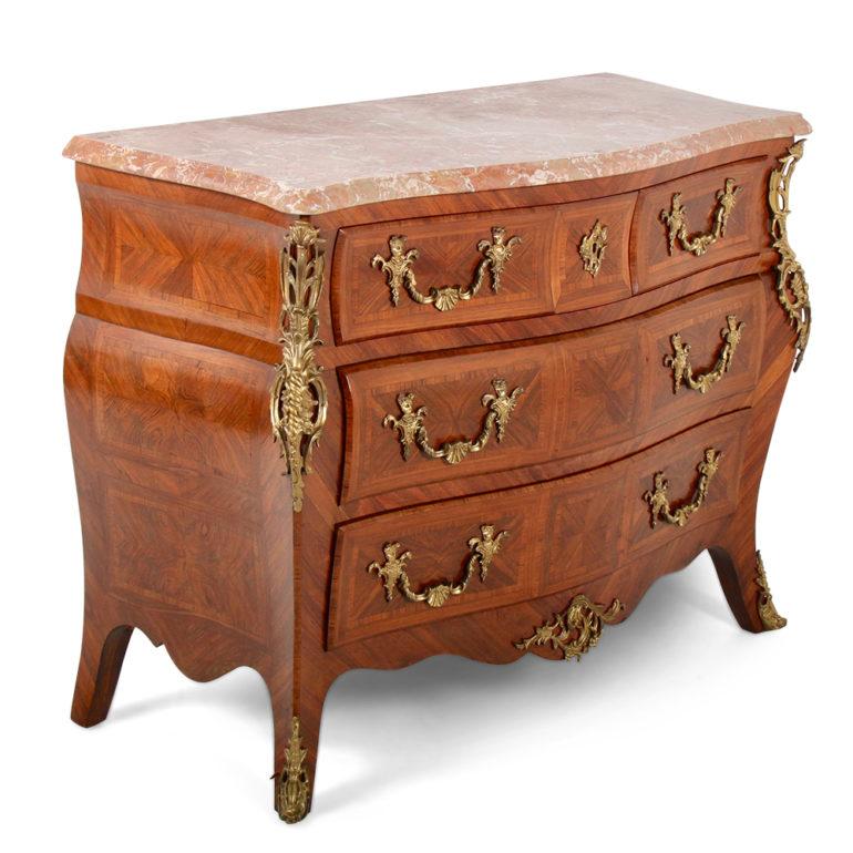 A highly detailed, Louis XV style, bombe commode from Paris, with stunning marble top. Marquetry and ormolus are beautiful, circa 1930. In excellent original condition.

 
