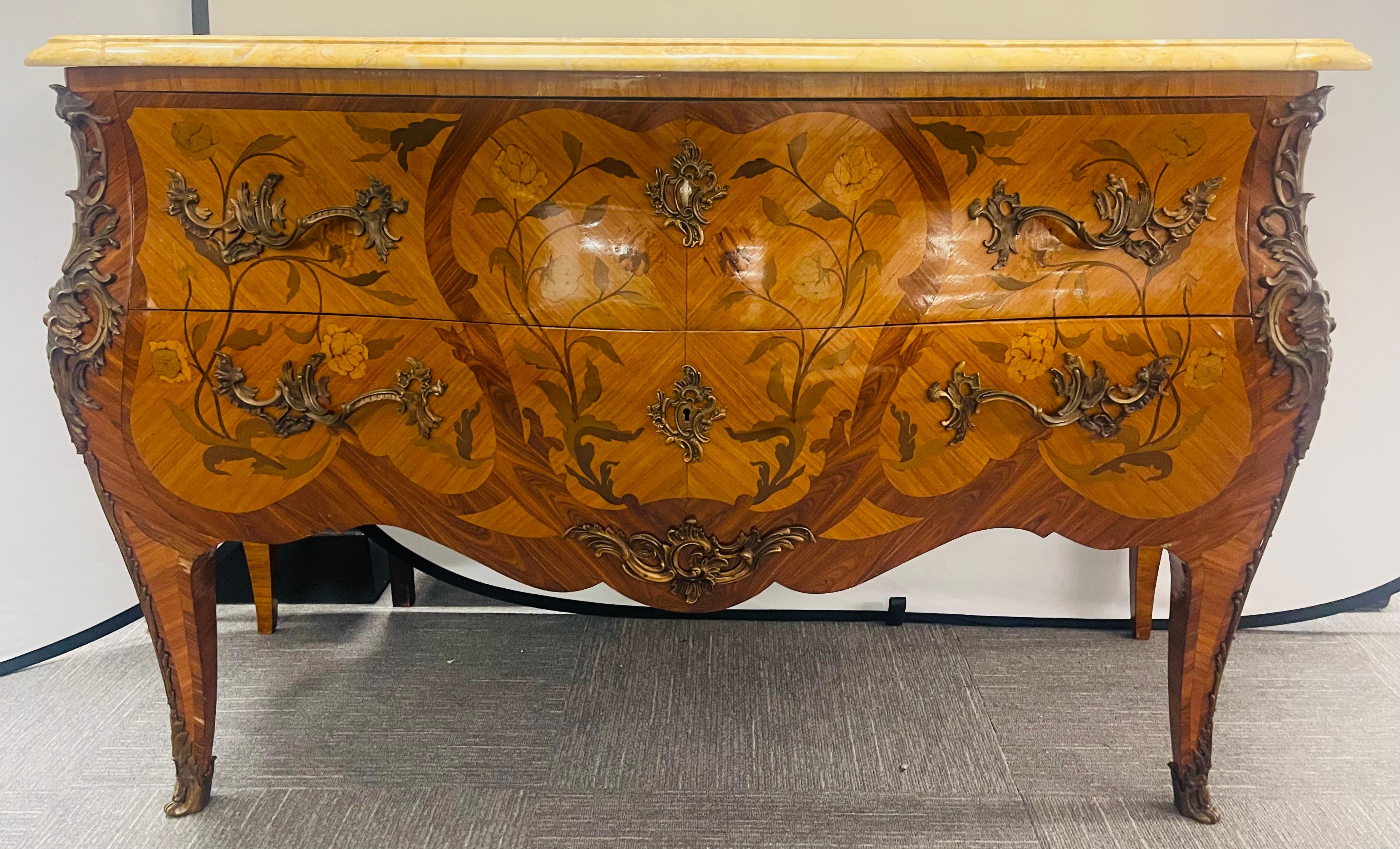 A finely crafted Louis XV style Commode or chest of drawers. The whole having oak secondaries with bronze mounts and full bronze mounted corners running from the full shoe sabots to the top of the chest. The chest having a wonderful floral and vine