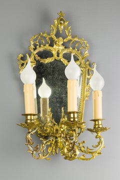 Louis XV Style Brass and Bronze Three-Arm Mirrored Girandole Wall Sconce