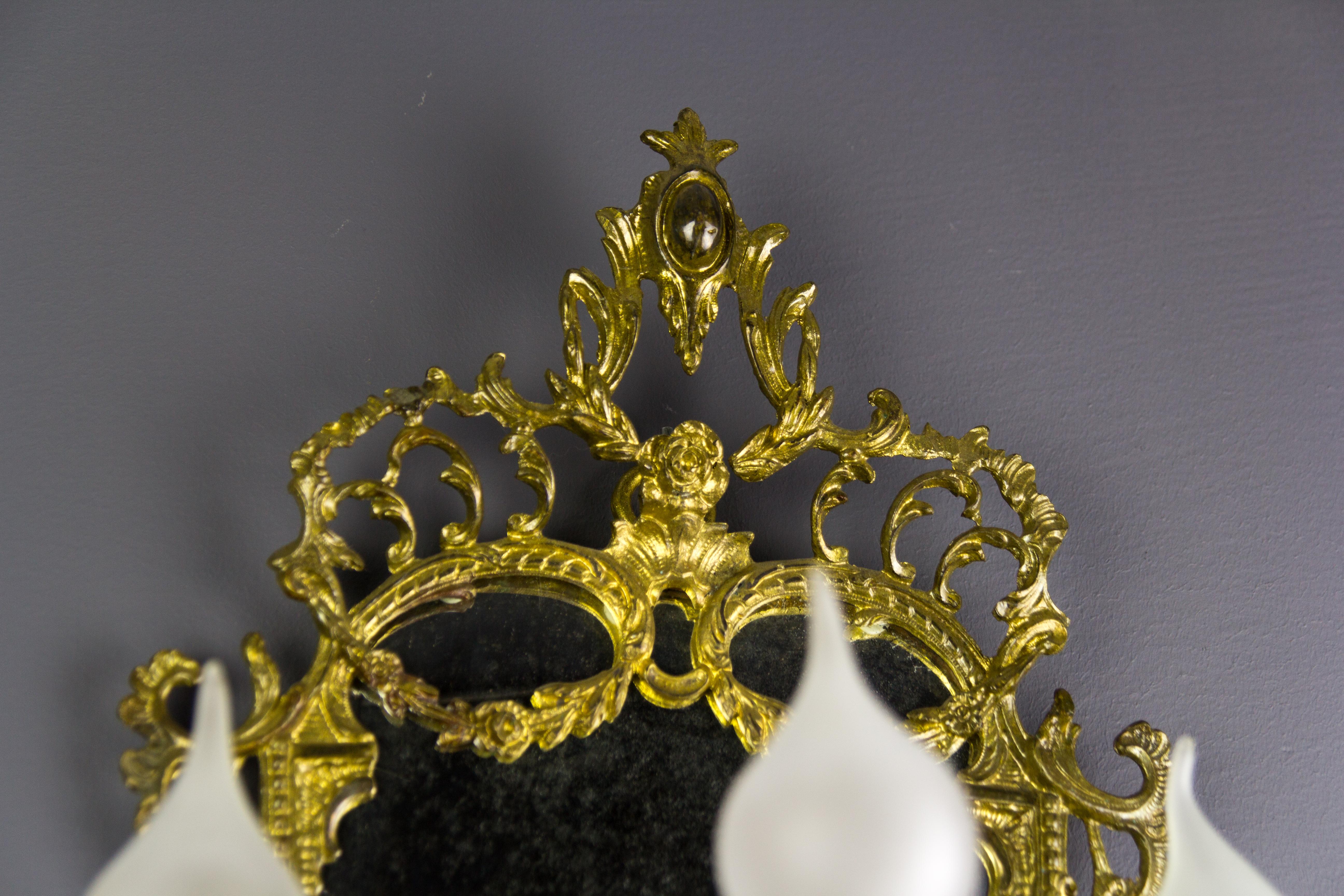 Early 20th Century Louis XV Style Brass and Bronze Three-Arm Mirrored Girandole Wall Sconce For Sale