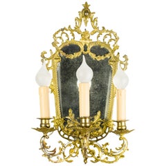 Louis XV Style Brass and Bronze Three-Arm Mirrored Girandole Wall Sconce