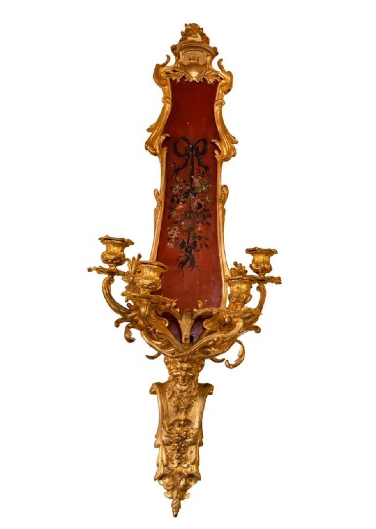 Very unusual and exceptional quality Louis XV style three-piece, French, 19th century bronze-mounted hand-painted Verni Martin clock barometer and sconces garniture set.