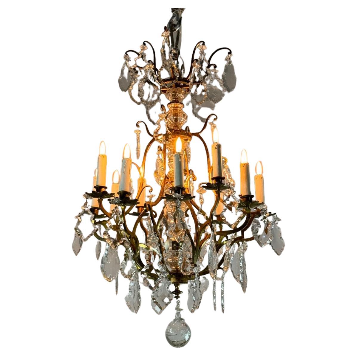 Lustre cage de style Louis XV en bronze doré garni de glands Circa 1920
