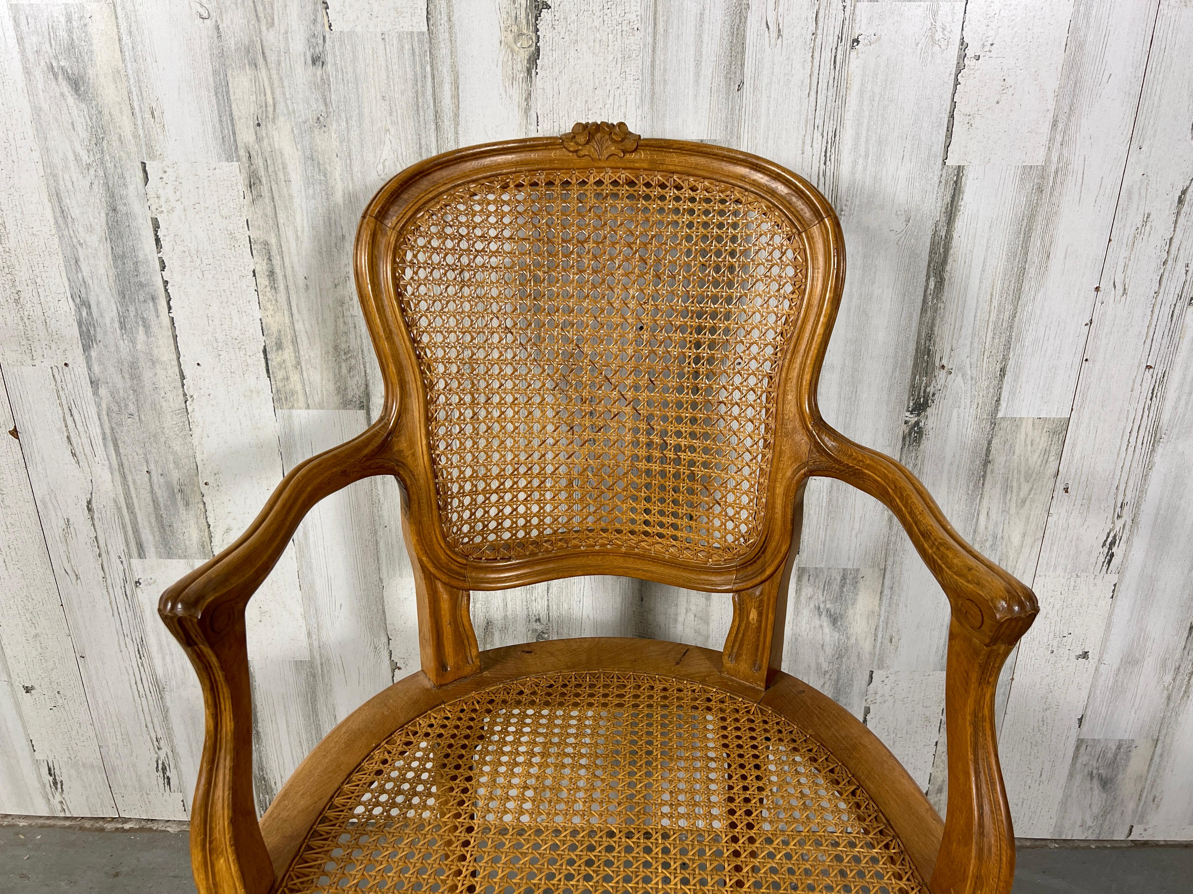 20th Century Louis XV style Cane Arm Chair