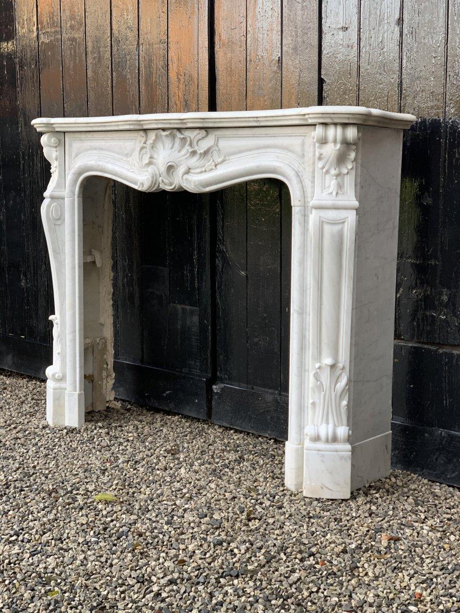 Louis XV style Carrara white marble fireplace.