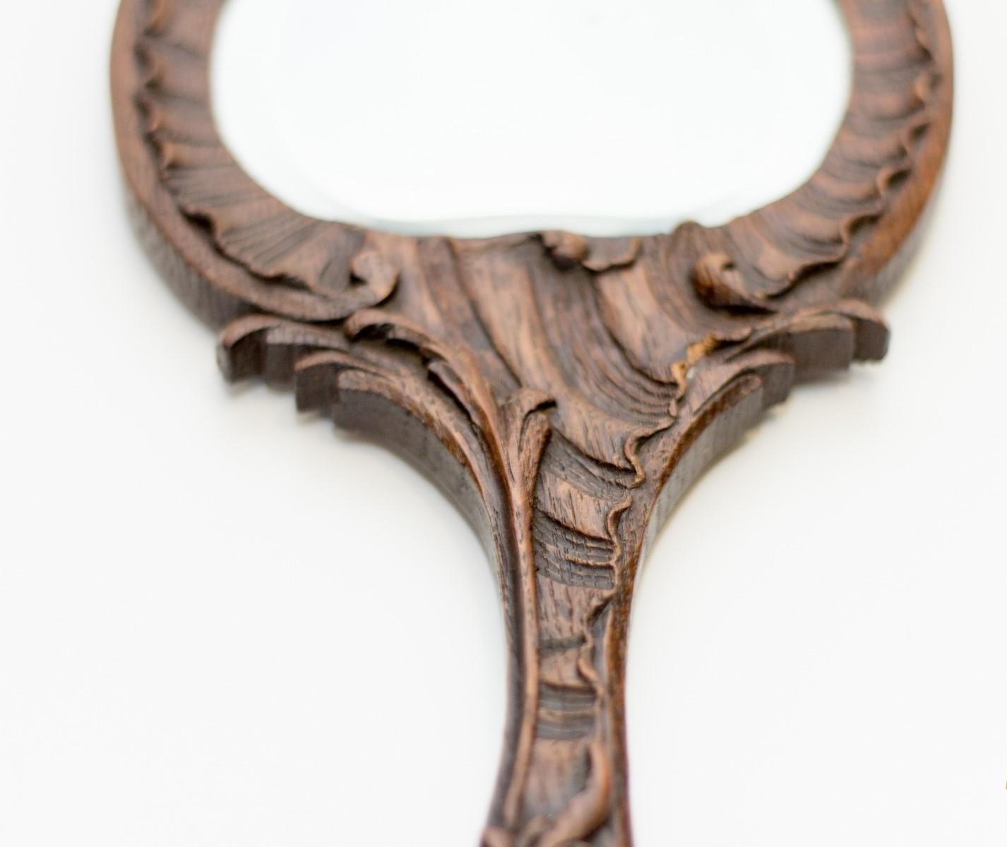 French Louis XV Style Carved Oakwood Hand Mirror, France, 1920's For Sale