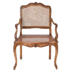 Louis XV Style Carved Walnut and Cane Fauteuil