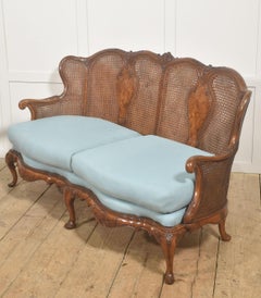 Louis XV Style Carved Walnut and Cane Settee