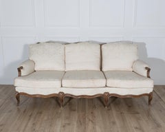 Louis XV Style Carved Walnut Sofa with Cream Damask Upholstery