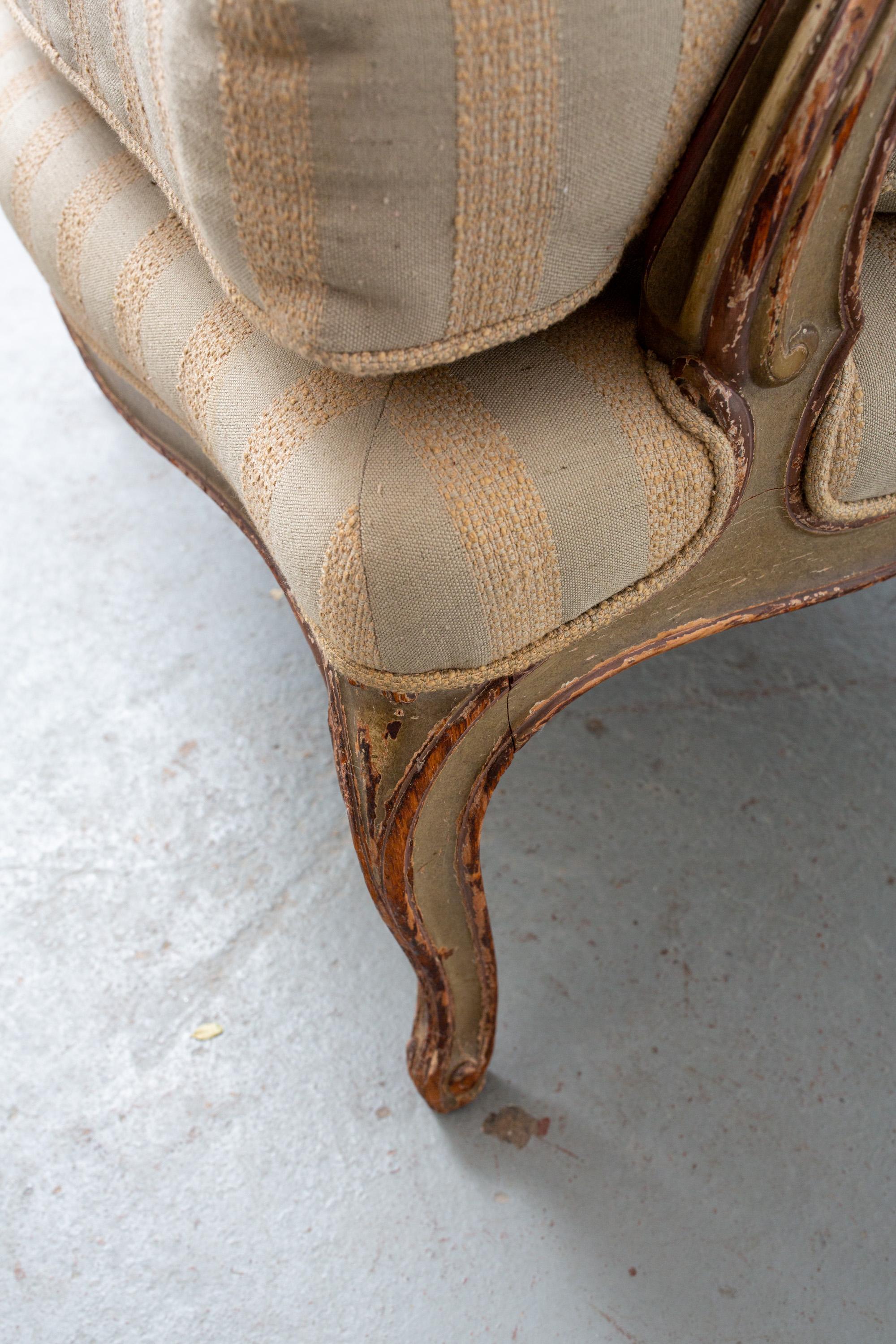 French Louis XV Style Carved Wood Armchair with Feather Down Cushioning For Sale