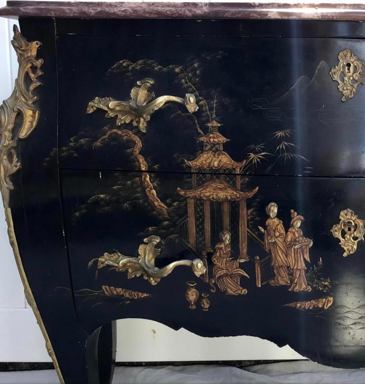 Excellent quality marble top Louis XV commode with Chinoiserie decorated serpentine front commode. Lacquered Chinoiserie designs with intricate raised gilt painted decoration, well-cast gilt-bronze mounts, two drawers with working lock and key, and