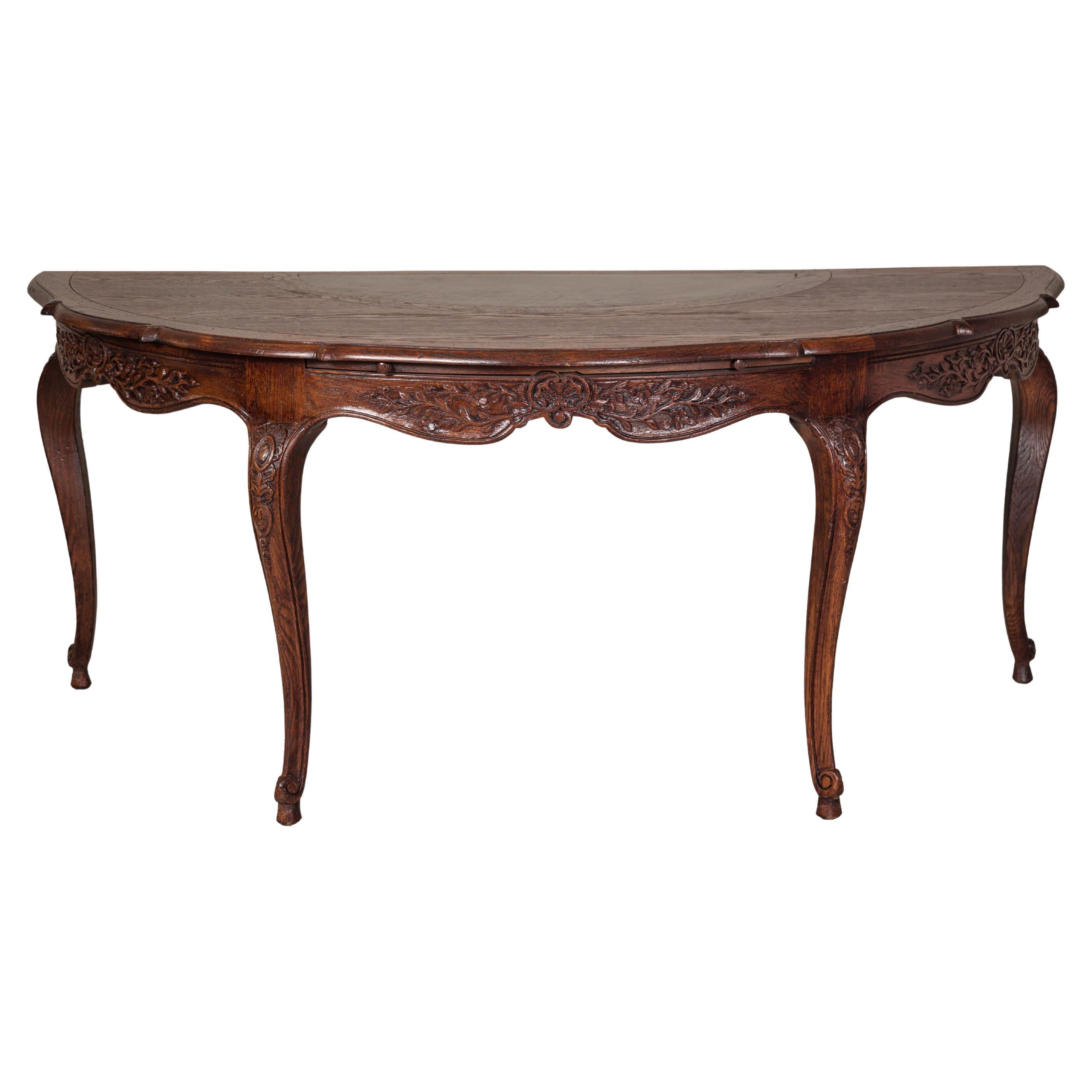 Bureau Demi-Lune de style Louis XV avec pieds sculptés, plateau en cuir et tiroirs cachés