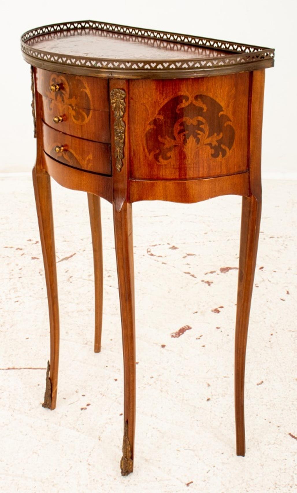 Louis XV style demilune marquetry nightstand, the giltmetal reticulated galleried top with floral marquetry designs above two drawers, on elongated cabriole legs. 

Dimensions: 29.5