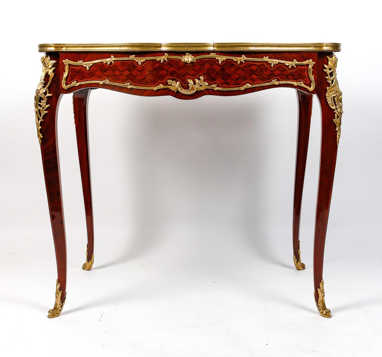 Louis XV style desk and side table, 19th century.

Louis XV style desk, side table, 19th century, Napoleon III period in precious wood marquetry and chased and gilded bronze, 1 large drawer in the waist.    
h: 74cm , w: 81.5cm, d: 54cm