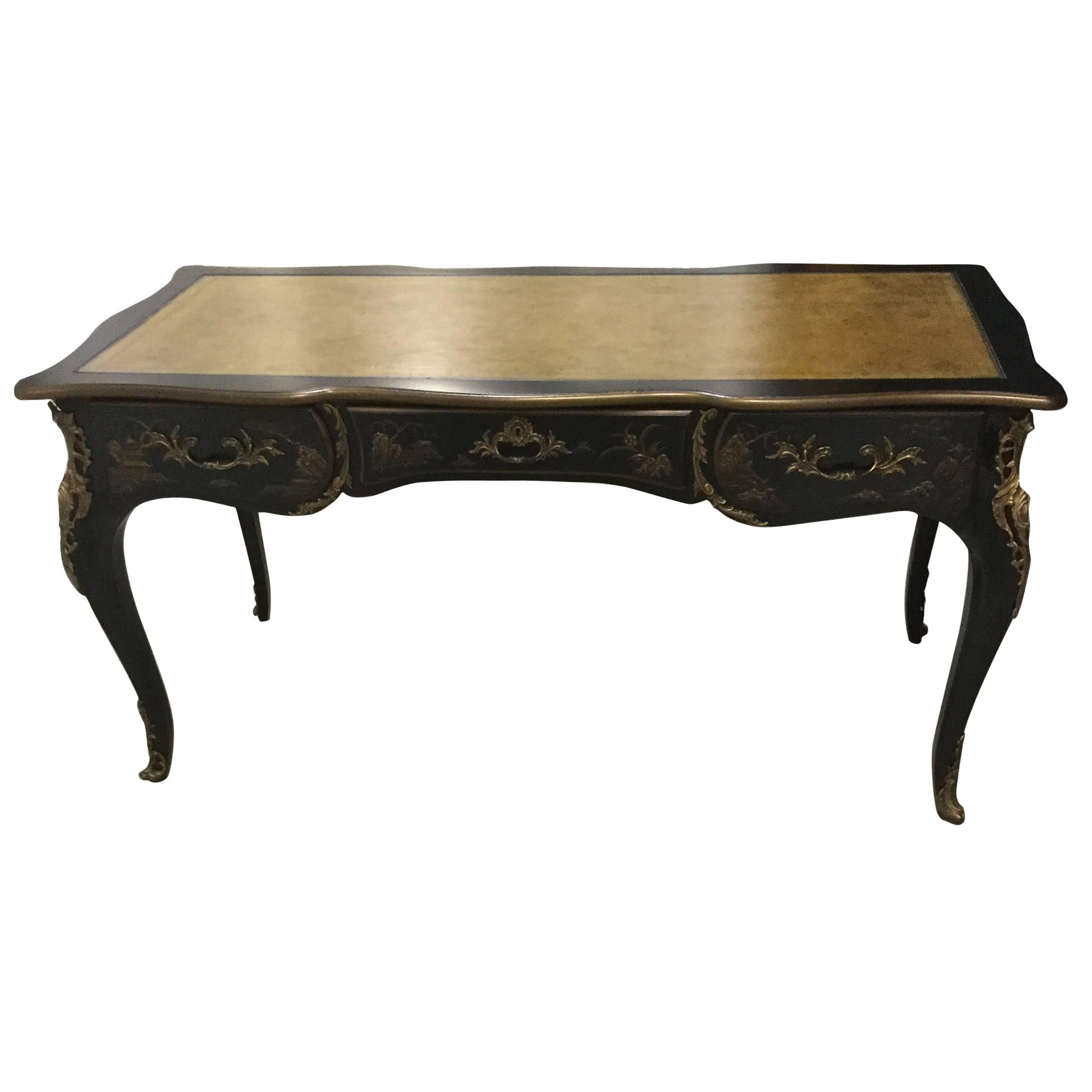 Beautiful Louis XV French Style Karges bureau plat in great condition. This Louis XV chinoiserie desk was made in
 1972 and it has the original brass that on the inside. Hardware has been cleaned and is very ornate. Desk is in black with a light