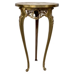 Louis XV Style Doré Bronze and Upholstered Top with Brass Guéridon Table