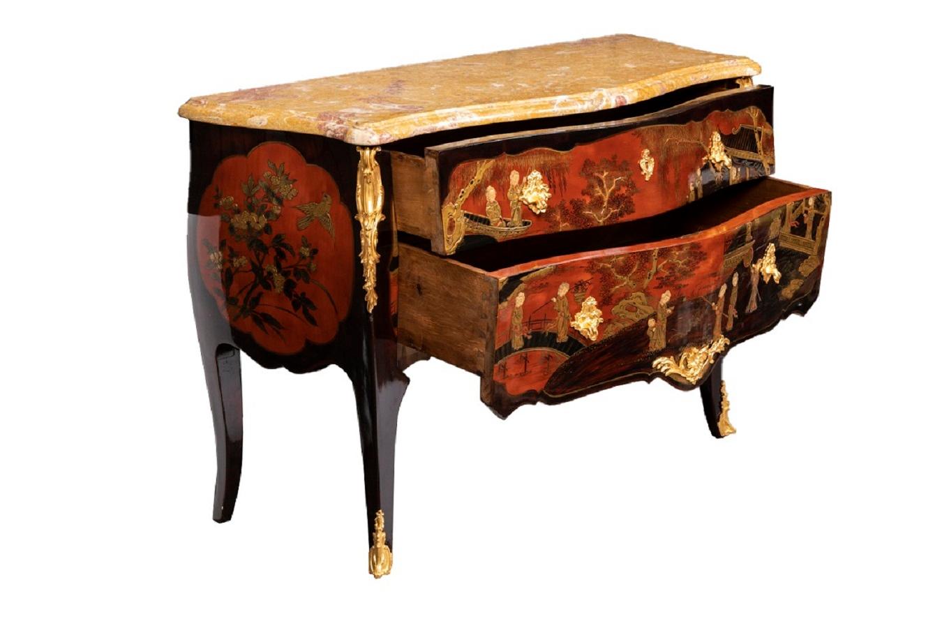 Louis XV style drawer commode opening by two front drawers on two levels without crossbar and standing on four cabriole legs. Bulged shape and inferior scalloped bar.
Brown lacquer decor adorned with large red background Chinese cartouches figuring