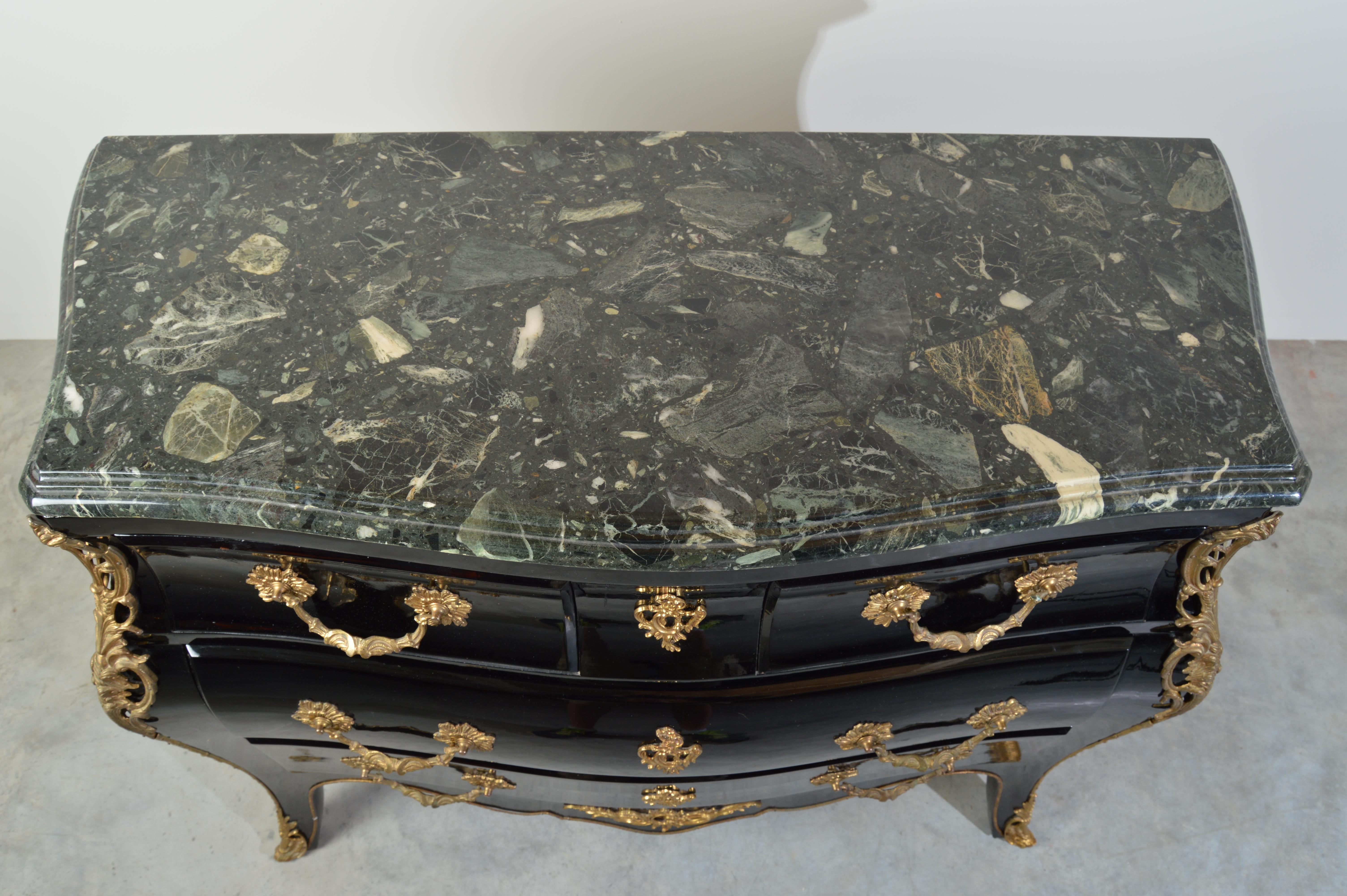 Late 19th Century Louis XV Style Ebonized Marble Top Bombe Chest Commode Having Bronze Details