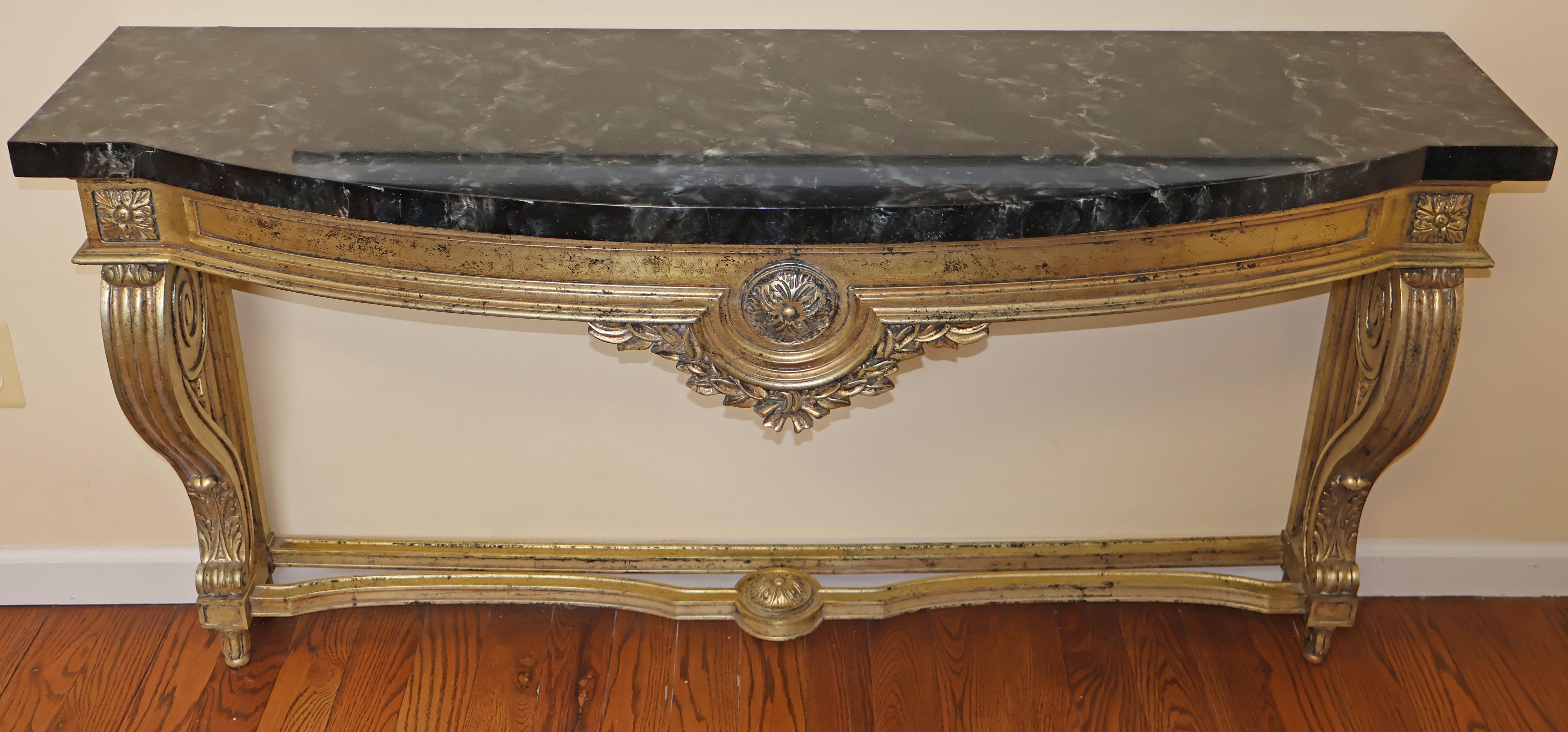 Louis XV Stil Faux Marmor Gold Konsolentisch zugeschrieben Maison Jansen

Abmessungen: 59
