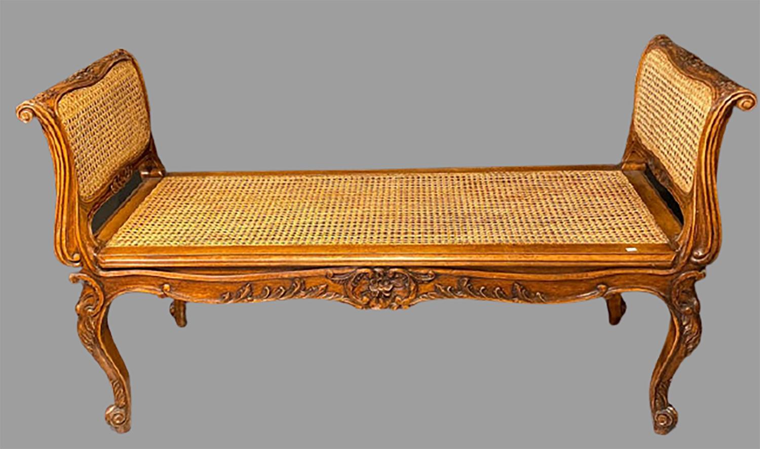 Louis XV style finely carved walnut window seat bench. The seat height is measured without the cushion 17.25 inches. This strong and sturdy window seat or bench is simply stunning and has been carved by a superb craftsman. The solid walnut bench is