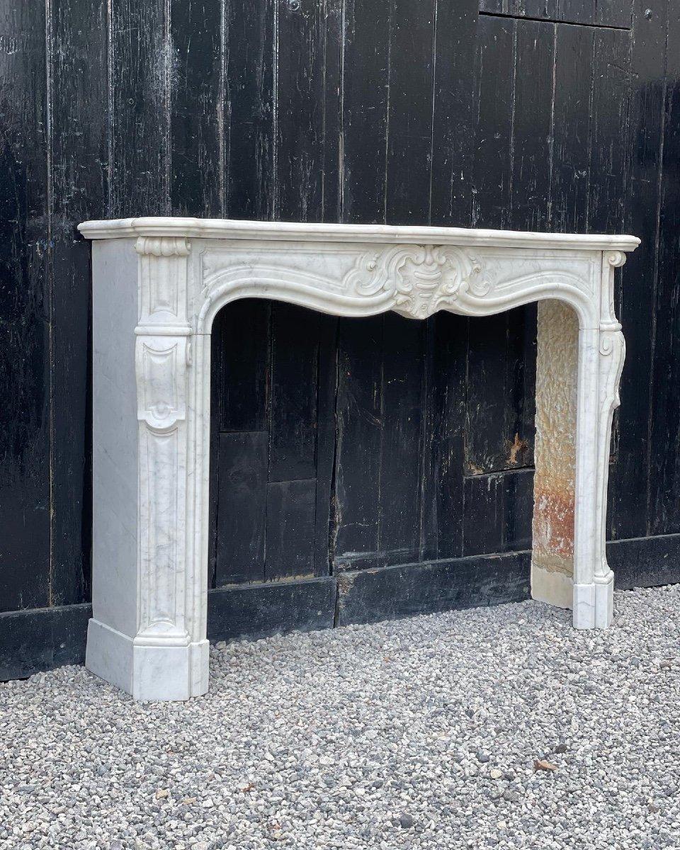 Louis XV style fireplace in Carrara marble dimensions of the hearth 85 x 108cm.
